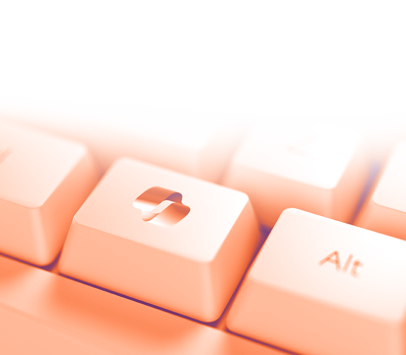 foto con gradiente arancione sfumato sul bianco dove in primo piano appare il dettaglio di una tastiera, in un tasto c'è il logo di copilot e nel secondo il tasto alt